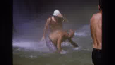 Utah (1969): People In A Pool Of Water With More Water Rushing Downward And