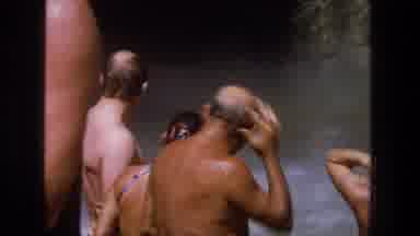 Utah (1969): Group Of People In Swimwear Near Waterfall And Pool Water Spray