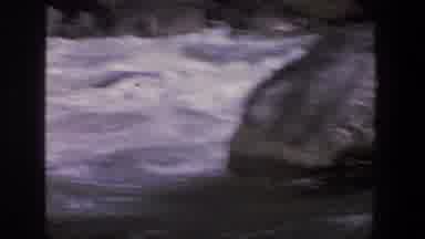 Utah (1969): A Group Of People White Water Rafting Down A Rough River