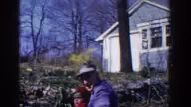 Pequot Lakes Minnesota (1964): A Father Plays With Her Daughter On Her Toy In
