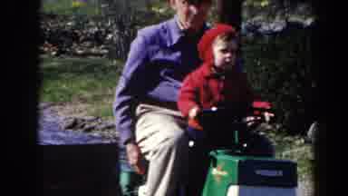 Pequot Lakes Minnesota (1964): Grandfather And Grandson Tour The Backyard On Lawn