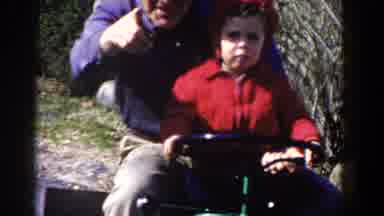 Pequot Lakes Minnesota (1964): Grandfather Wearing Denim And Grandchild Wearing
