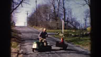 Pequot Lakes Minnesota (1964): Daddy And Son Passing Time Together