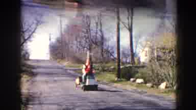 Pequot Lakes Minnesota (1964): Happy Father And Happy Son Driving A Toy Car On The