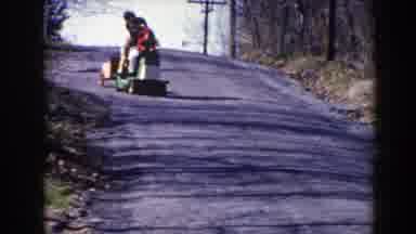 Pequot Lakes Minnesota (1964): Man Wearing White Sweater Gives Toddler Wearing Red