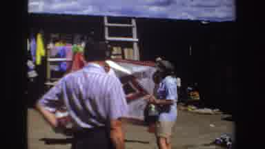 South Africa (1969): Foreign Tourists At African Clothing Fair Seller Offering