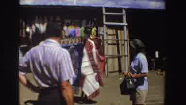 South Africa (1969): People On The Street Traveling And Doing Their Shopping In A