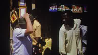 South Africa (1969): An African Boy Showing To A Woman Some Colorful Bowls