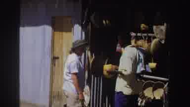 South Africa (1969): Vintage Footage Of Woman Who Considers Purchasing Item From