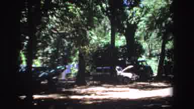 South Africa (1969): The Camera Zooms In On The Car That Has The Hood Popped