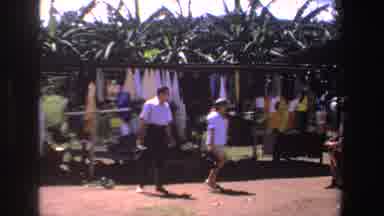 South Africa (1969): A Couple Shopping For Colorful Fabrics In An African Market