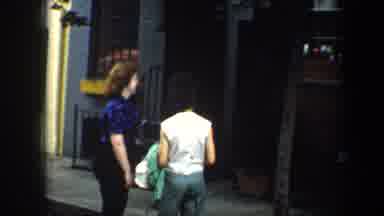Baltimore Maryland (1960): Two Women Walking Down A Street With Different