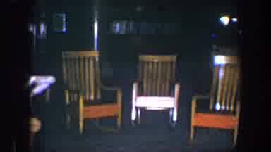 Baltimore Maryland (1960): Three Wooden Rocking Chairs That Appear To Be Rocking