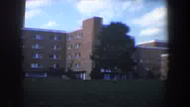 Baltimore Maryland (1960): The Camera Pans Across The Brown Building And Captures