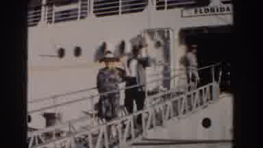 Nassau Bahamas (1961): Elderly Couple Go Down Ships Ladder After Anchorage In Port