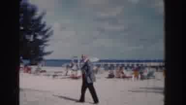 Nassau Bahamas (1961): Old Man Wearing A Jacket Walking On The Sand Alone