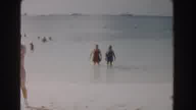 Nassau Bahamas (1961): Two Ladies In The Sea Of A Beach With Swimsuits Amid