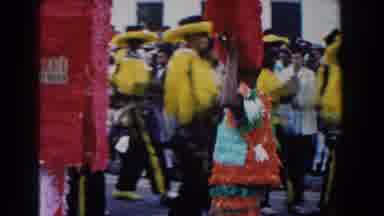 Nassau Bahamas (1961): People Dressed In Costume Walk In A Parade As Spectators