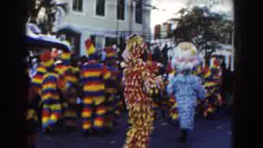 Nassau Bahamas (1961): Crowd Watching Costumed People Parading On The Street