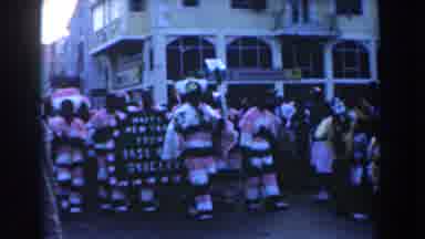 Nassau Bahamas (1961): Men Dressed Up And Parading Down The Street