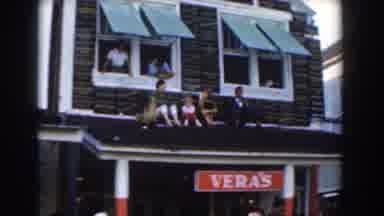 Nassau Bahamas (1961): View Of Brown And White Building With Red VeraS Sign