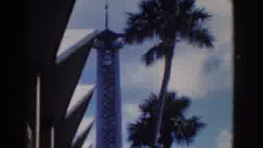 Nassau Bahamas (1961): A Tall Building In The Sky And A Woman In The Restaurant