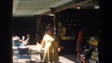 Nassau Bahamas (1961): Woman In A Yellow Dress Walking Towards The Camera Followed