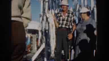 Nassau Bahamas (1961): The Couple Catches Fishes On The Boat