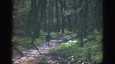 Cincinnatti Ohio (1949): A Little Boy Dressed In A Trench Coat And A Hat Outside