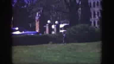 Cincinnatti Ohio (1949): A Kid Wearing A Jacket Runs Across The Field And Picked