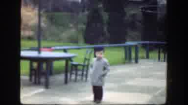 Cincinnatti Ohio (1949): Girl Wearing Yellow Coat With Brown Hat Walks Away From