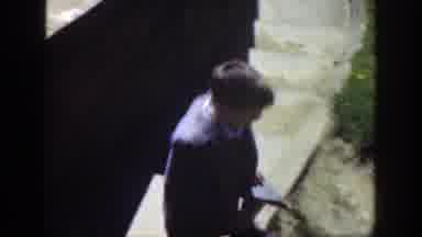 Cincinnatti Ohio (1949): A Small Child Is Running And He Wears A Suit