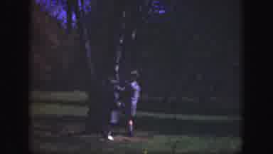 Cincinnatti Ohio (1949): Small Boy And Girl Wearing Blue Coats Play On Green Grass