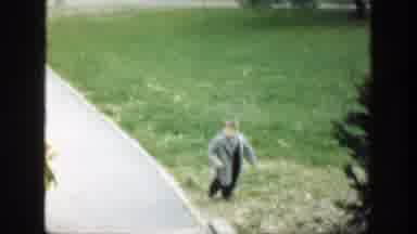 Cincinnatti Ohio (1949): Young Children Run Up Front Yard To Greet Camera Man