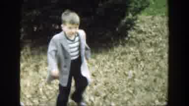 Cincinnatti Ohio (1949): Blonde Boy In Striped Shirt Tries To Walk In His Father's