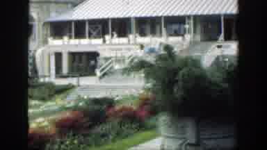 Cincinnatti Ohio (1949): Park With Flowers Trees And A Building In Cincinnati In