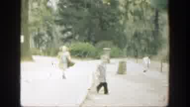 Cincinnatti Ohio (1949): A Boy And His Sister Both Wearing Jackets Walk Around The