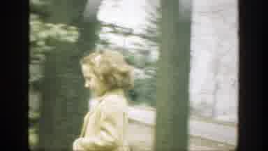 Cincinnatti Ohio-1949: Girl Walking With A Little Boy In The Park