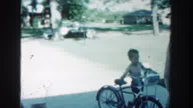 Wisconsin (1964): Child Arriving With A Bicycle And Hiding Behind A Woman In A