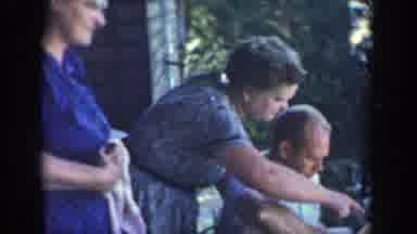 Wisconsin (1964): Man Sat Down With Two Older Ladies Looking At What He's Doing