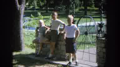 Wisconsin (1964): Three People Waiting On The Mainland For A Boat To Come And Dock