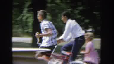 Wisconsin (1964): Boys Riding Bikes While Dad Has A Beer In The Flower Garden