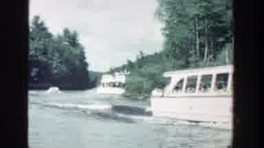 Wisconsin (1964): Travelers And Tourists Take A Tour On A Boat Riding Along A Fast