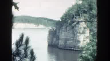 Wisconsin (1964): View Of Small Wooden Bridge Over Calm Water And Green Trees On A