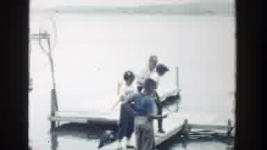 Wisconsin (1964): Funny Man Joking With Lady On Pier As White Kids Watch
