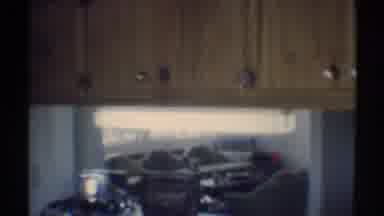 Woodland Hills California (1969): Viewing Living room From Kitchen Showing Couches