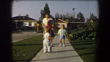 California (1958): Three Young Children Going For A Short Walk On A Sidewalk With