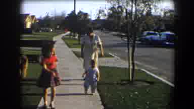California (1958): A Woman Having A Walk With Her Two Kids And Her Dog