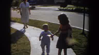 California (1958): Two Children Walking On Sidewalk Stroller And Parents Or