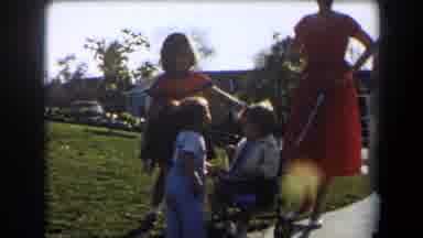 California (1958): One Baby Walking And Another In The Stroller And Adults Looking